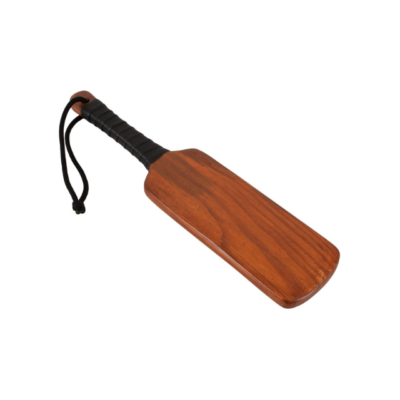 zado spanking paddle i træ er en bred paddle i massivt træ med læder håndtag